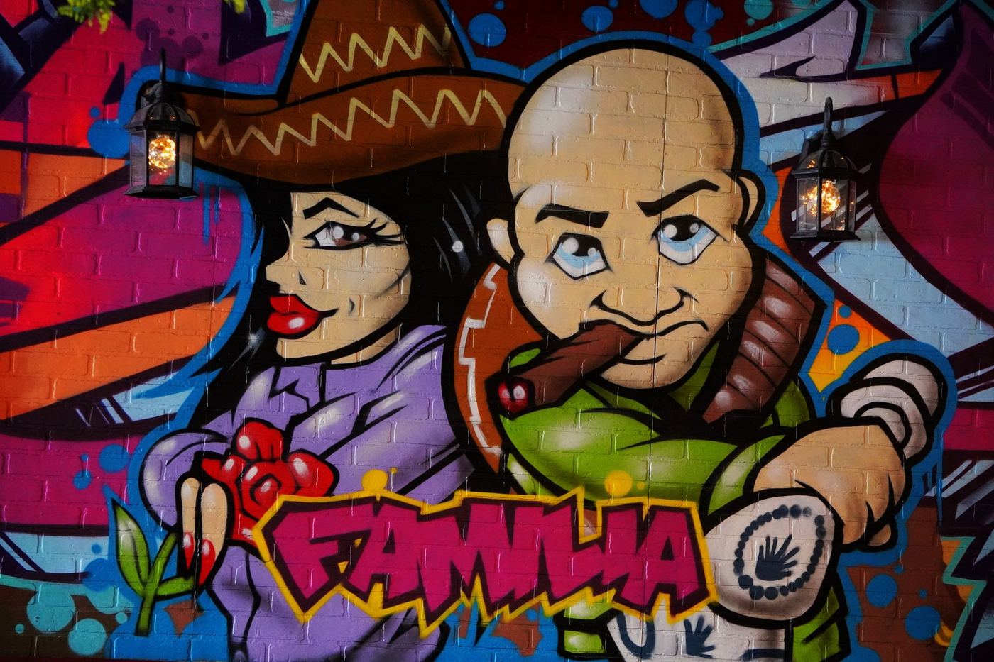 Dining room at La Mesa with the Familia mural